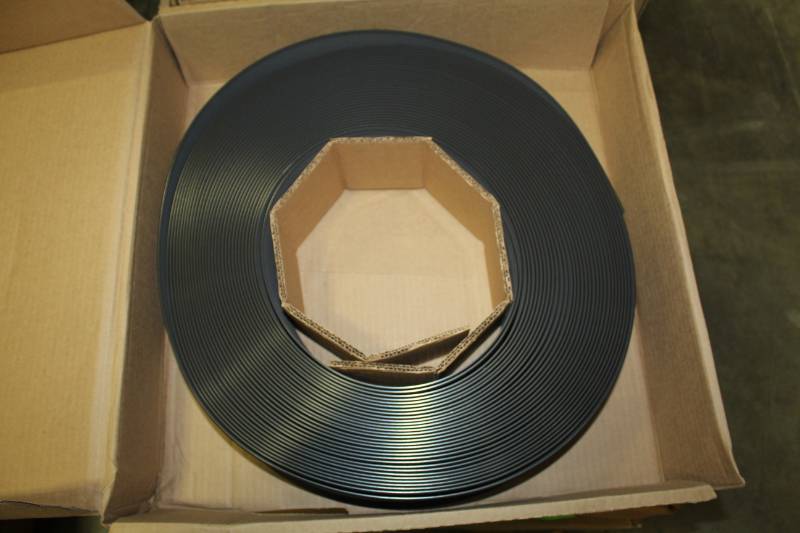 lot 375 image: Lot of (4) Boxes of 4x18in. Rubber Cove Base Coil 120ft.