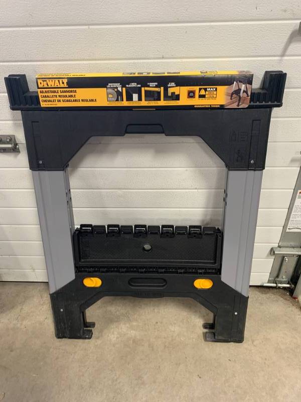lot 9 image: DeWalt Adjustable 2500lb Sawhorse ($54.99 at Acme)