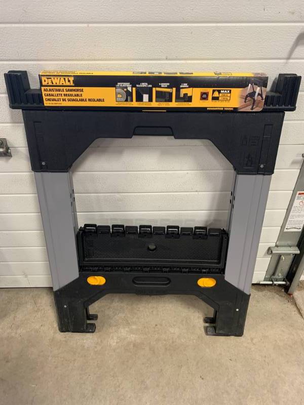 lot 10 image: DeWalt Adjustable 2500lb Sawhorse ($54.99 at Acme)
