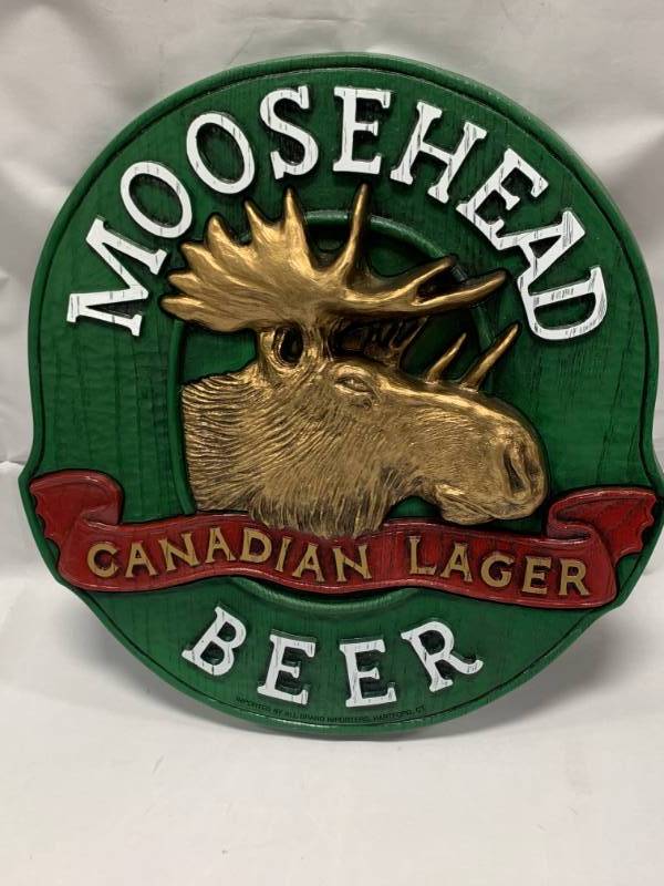 lot 57 image: Moosehead Beer Sign 14 Tall (brand new old stock)