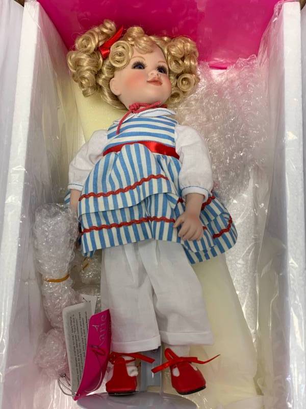 lot 11 image: Marie Osmond Little Lovey Porcelain 11 Doll $125 Retail