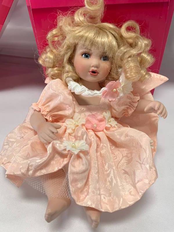 lot 21 image: Marie Osmond My Friend Tiny Tot Porcelain 7 Doll $140