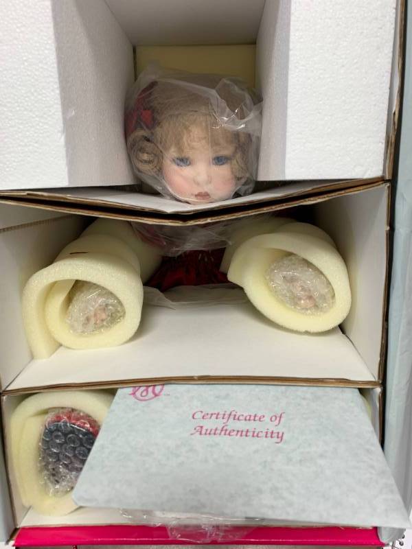 lot 25 image: Marie Osmond Melissa Virginia Holiday  Porcelain 15 Doll $85
