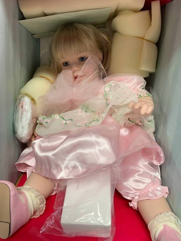 lot 29 image: SIGNED Marie Osmond Baby Peggy Porcelain 20 Doll $120