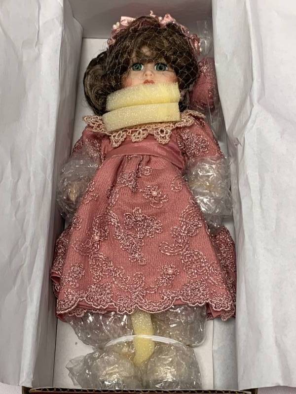 lot 55 image: Marie Osmond Charming Porcelain 9 Doll $77 Retail