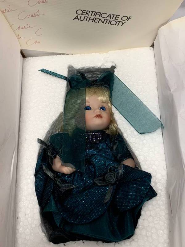 lot 56 image: Marie Osmond Sweet Pea Porcelain 5 Doll $60 Retail