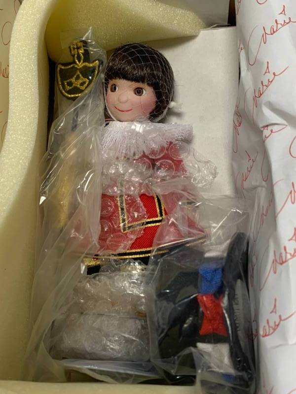 lot 64 image: Marie Osmond English Beefeater Porcelain 7 Doll $87.50 Retail