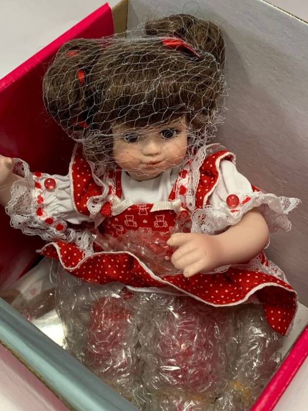 lot 69 image: Marie Osmond Very Beary in Love Porcelain 7 Doll $40 Retail