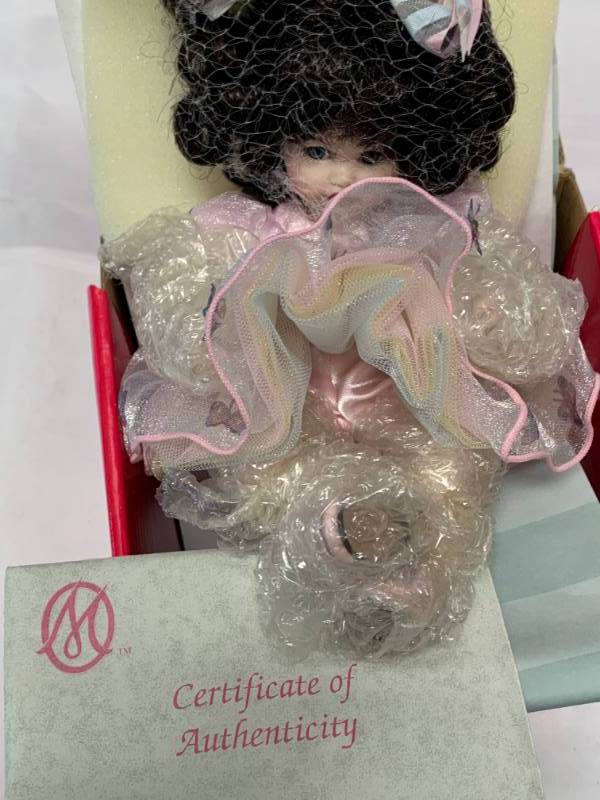 lot 73 image: Marie Osmond Susie Butterfly Porcelain 7 Doll $44