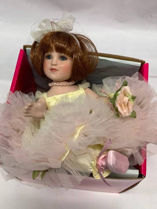 lot 80 image: Marie Osmond Peace Rose Bud Porcelain 7 Doll $41.75 Retail
