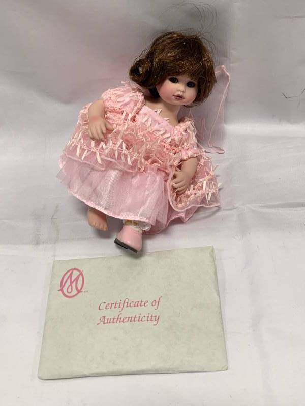 lot 98 image: Baby Abigail 7 Porcelain Doll (no box)
