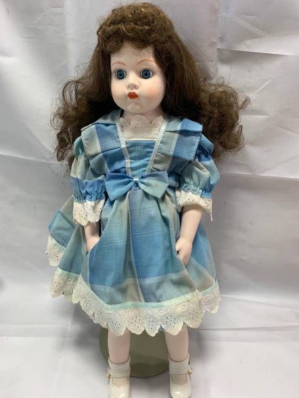 lot 104 image: Blue Dress Girl 21 Porcelain Doll (no box)