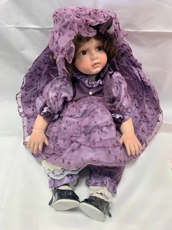 lot 107 image: Purple Dress 20 Porcelain Doll (no box)