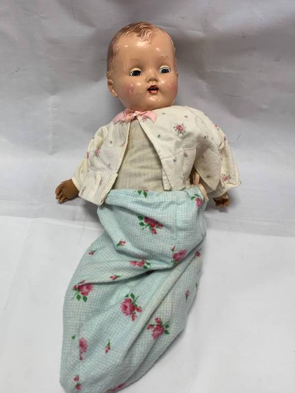 lot 114 image: Creepy Old Doll in Blanket