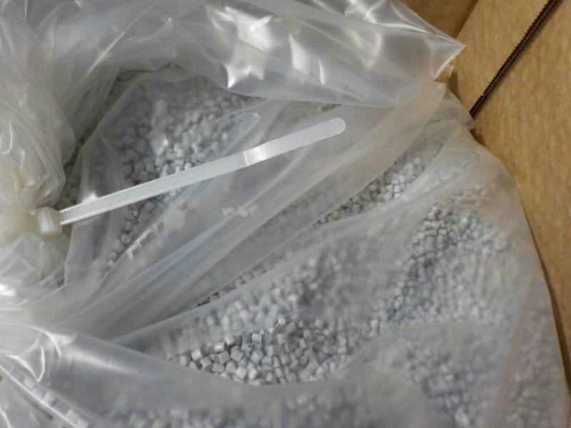 lot 5 image: 55 lbs. Box of Polycarbonates- grad...