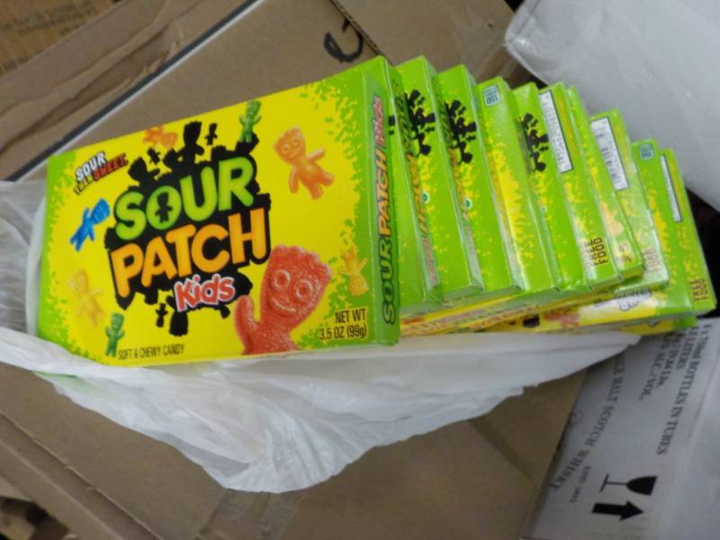 lot 102 image: 12 boxes Sour Patch Kids...