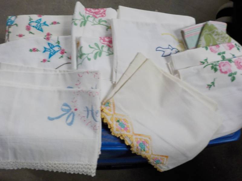 lot 134 image: 6 Sets of Cross Stitched Pillow Cas...