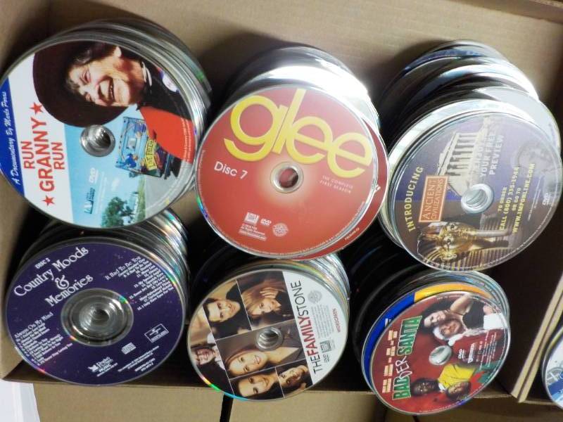 lot 175 image: 300 or more DVDs, CDs and Game...