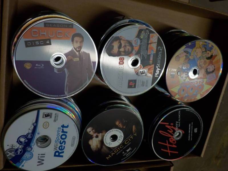 lot 176 image: 300 or more DVDs, CDs and Game...