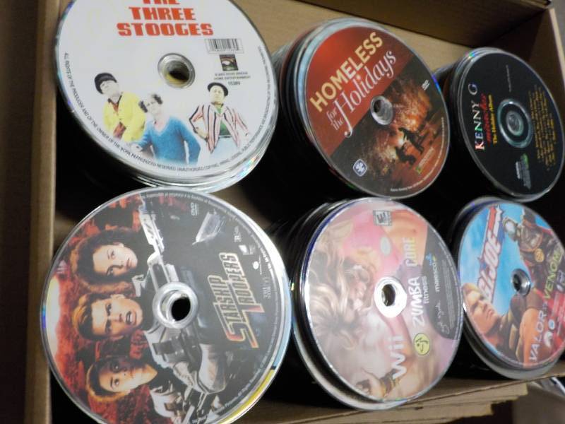 lot 178 image: 300 or more DVDs, CDs and Game...