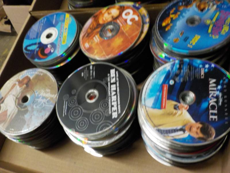 lot 179 image: 300 or more DVDs, CDs and Game...