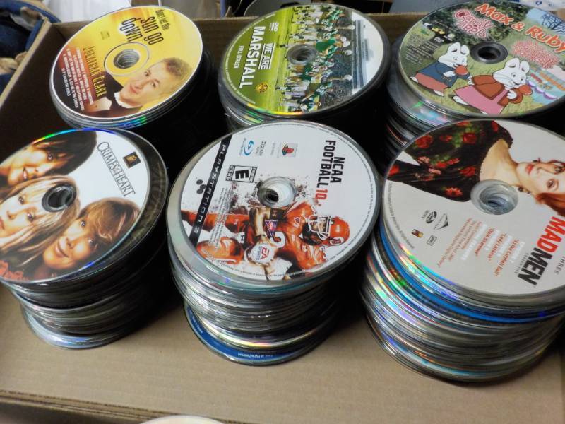 lot 180 image: 300 or more DVDs, CDs and Game...