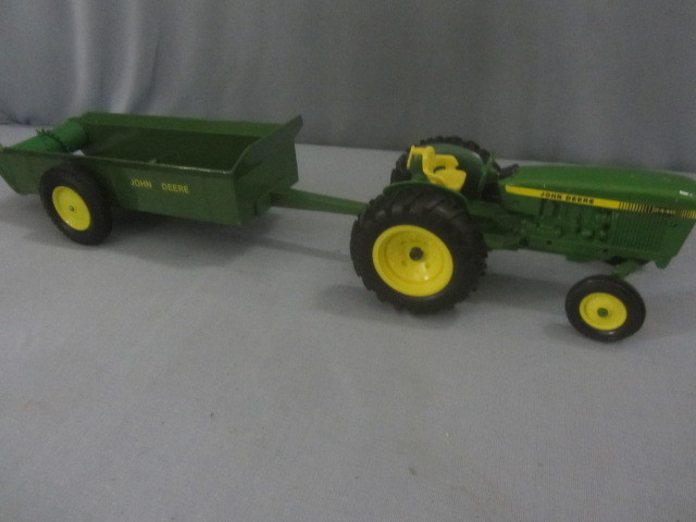 lot 23 image: John Deere ERTL 2440 Tractor