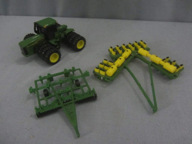 lot 29 image: JD Tractor, Planter, Disk