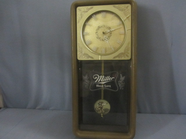 lot 101 image: Miller High Life Pendulum Clock