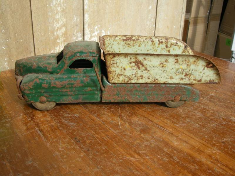 lot 55 image: Antique Buddy L Dump Truck