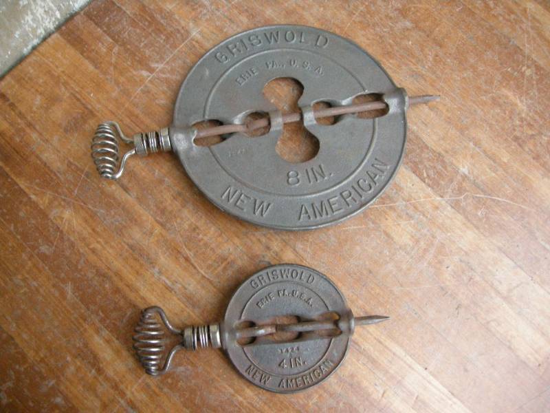 lot 84 image: Pair Antique Griswold Dampeners