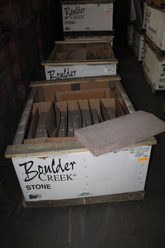 lot 28 image: Lot of (38) Boulder Creek Peaked Wall Cap 12x24x3in.