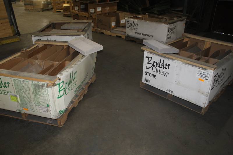 lot 49 image: Lot of (66) Boulder Creek Light Grey Peaked Capstone 12x20x3, Light Grey Flat Capstone 12x20x3, Pewter Grey Peaked Capstone 12x20x3