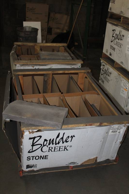lot 51 image: Lot of (35) Boulder Creek Tivoli Peaked Capstone and Flats 12x20x3in.