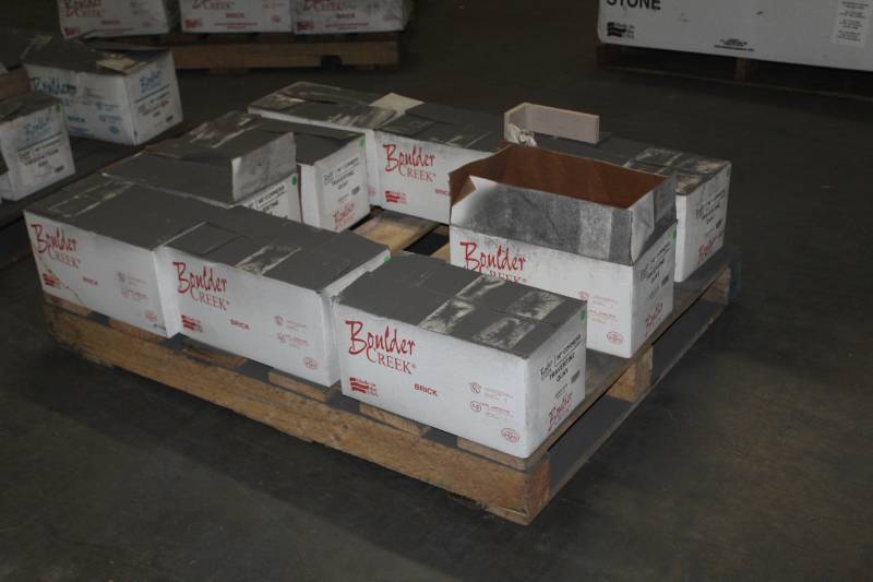 lot 95 image: Lot of (9 Boxes) Boulder Creek Travertine Quay 90 Degree Corners