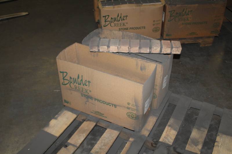 lot 112 image: Lot of (2 Boxes) Boulder Creek Rollock Sunburst Taupe 24x4x2in.