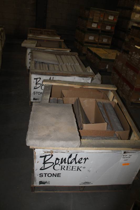 lot 240 image: Lot of (73) Boulder Creek Capstone 16x24in. Flat Tivoli, Hearthstone 18x20in. Light Gray, Wall Cap 12x24in. Flat Antique Tan, Capstone 12x20x3in. Peaked Pewter Gray
