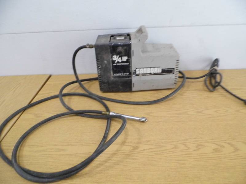 lot 12 image: Sanborn Air Compressor