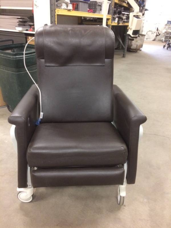 lot 41 image: WOW MSRP $3000 Winco Dual Swingaway Arm Carecliner Reclining Geri Chair With Heat & Massage - Easy Access For Wheelchair Patients - Great Working Condition Has Trays On Both Sides