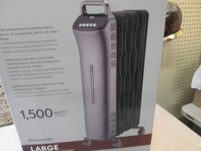 lot 9 image: SAI Oil-Filled Radiator Heater Open...