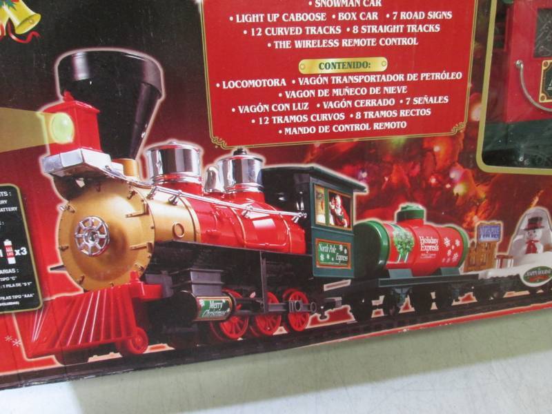 lot 17 image: North Pole Express 33pc Christmas T...