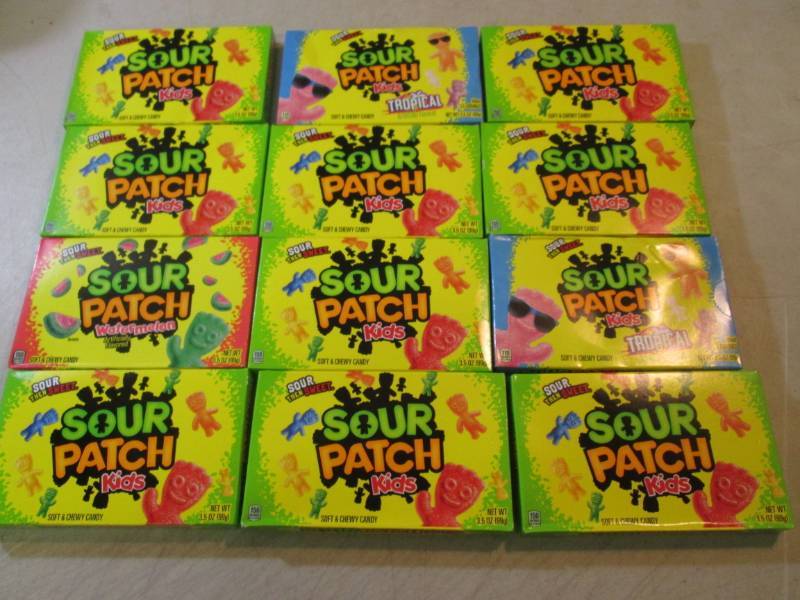 lot 56 image: 12 Assorted Boxes of Sour Patch Kid...