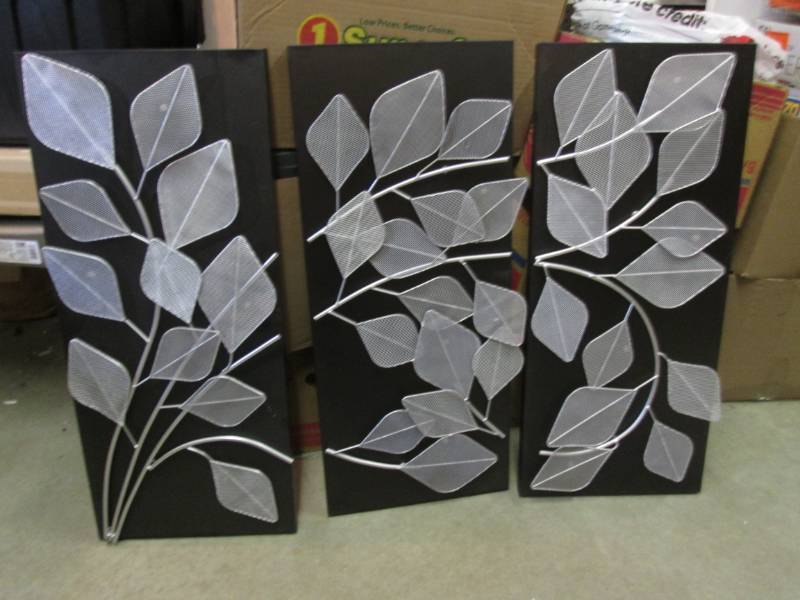 lot 65 image: Unopened 3pc Metal Light-Up Wall De...