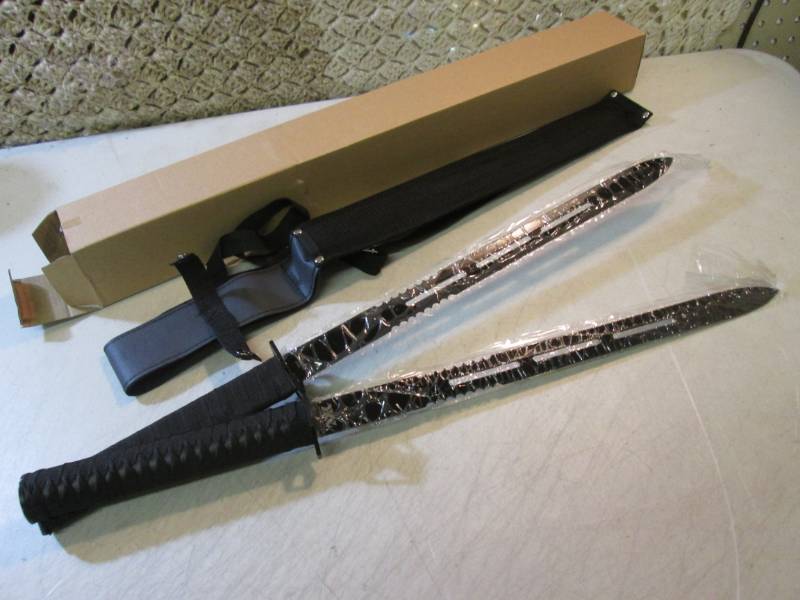 lot 88 image: 24 Magnetic Double Sword with Shea...