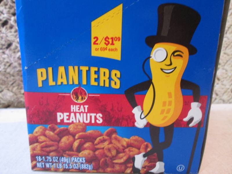 lot 115 image: Box of 18 Bags of Planters Heat Pea...