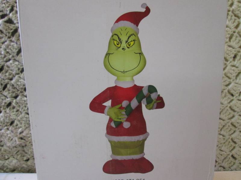 lot 211 image: 4 ft Grinch with Candy Cane Inflata...