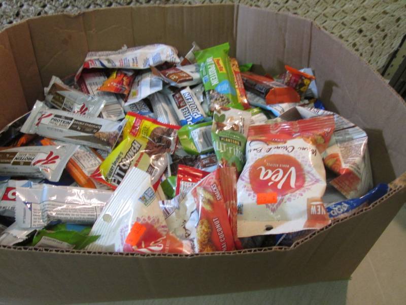 lot 262 image: Box Full of Assorted Protein Bars E...