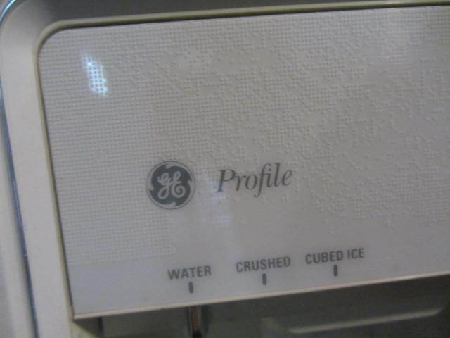 lot 15 image: GE Side-by-Side Refrigerator