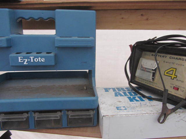 lot 121 image: Battery Charger, First Aid Kit