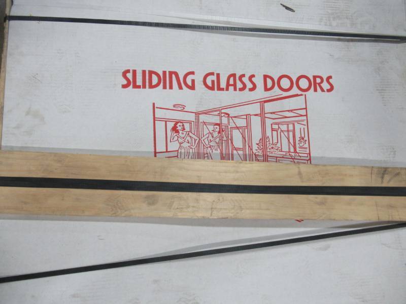 lot 260 image: Sliding Glass Patio door, Manufacturer unknown. Approximate measurements Each Door 36 12 X 94 Tall.